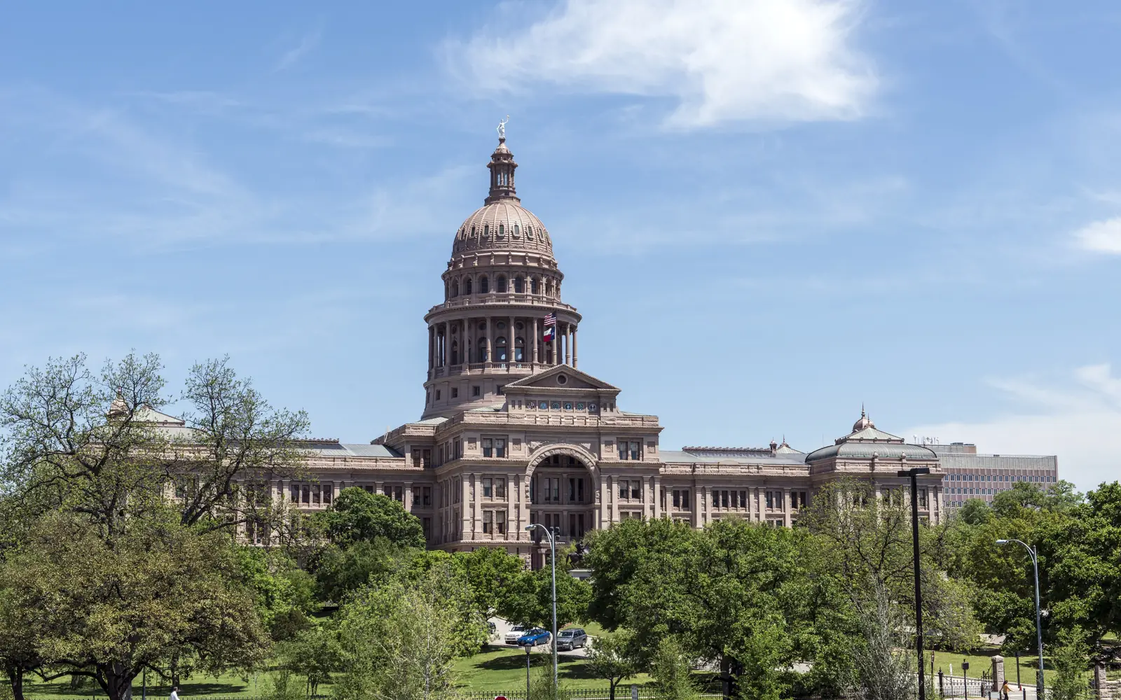 The Texas State Capitol in Austin under a blue sky